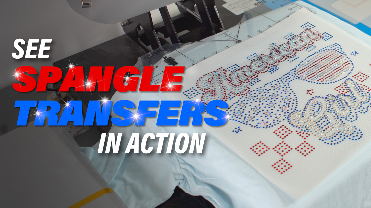 Red, white and blue spangle transfer design on a shirt on a heat press